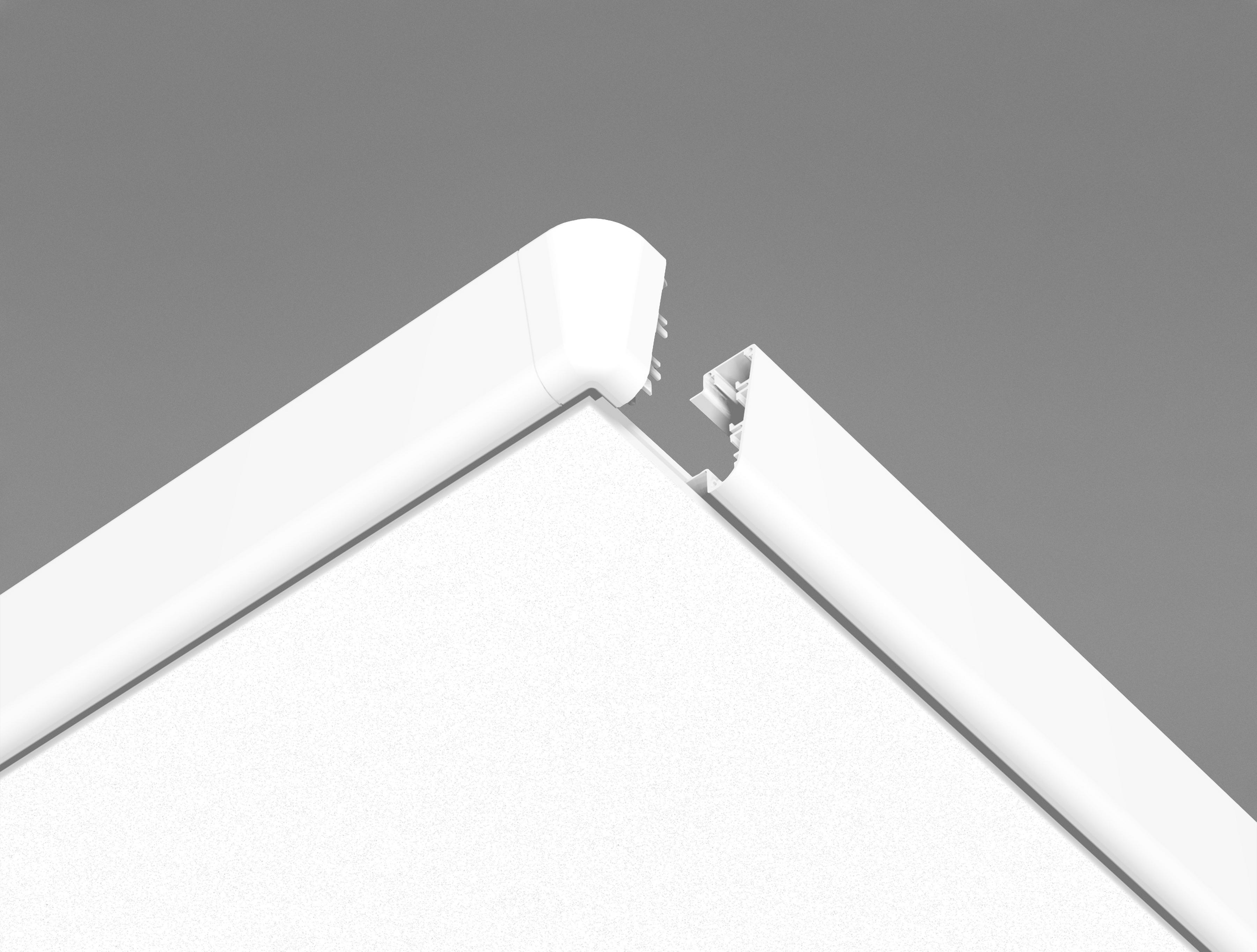 Primo piano di una modanatura angolare bianca su una parete, su uno sfondo grigio, che mostra uno spazio vuoto nel punto in cui due elementi dovrebbero connettersi, con una delle parti priva della sezione terminale.