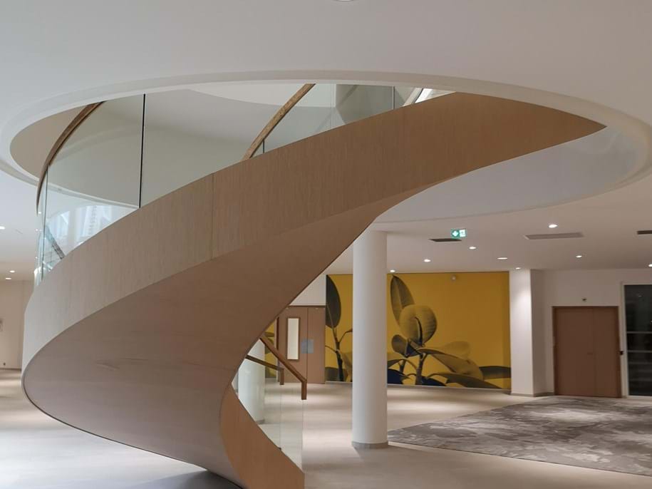 Staircase covered in acoustic stretch fabric
