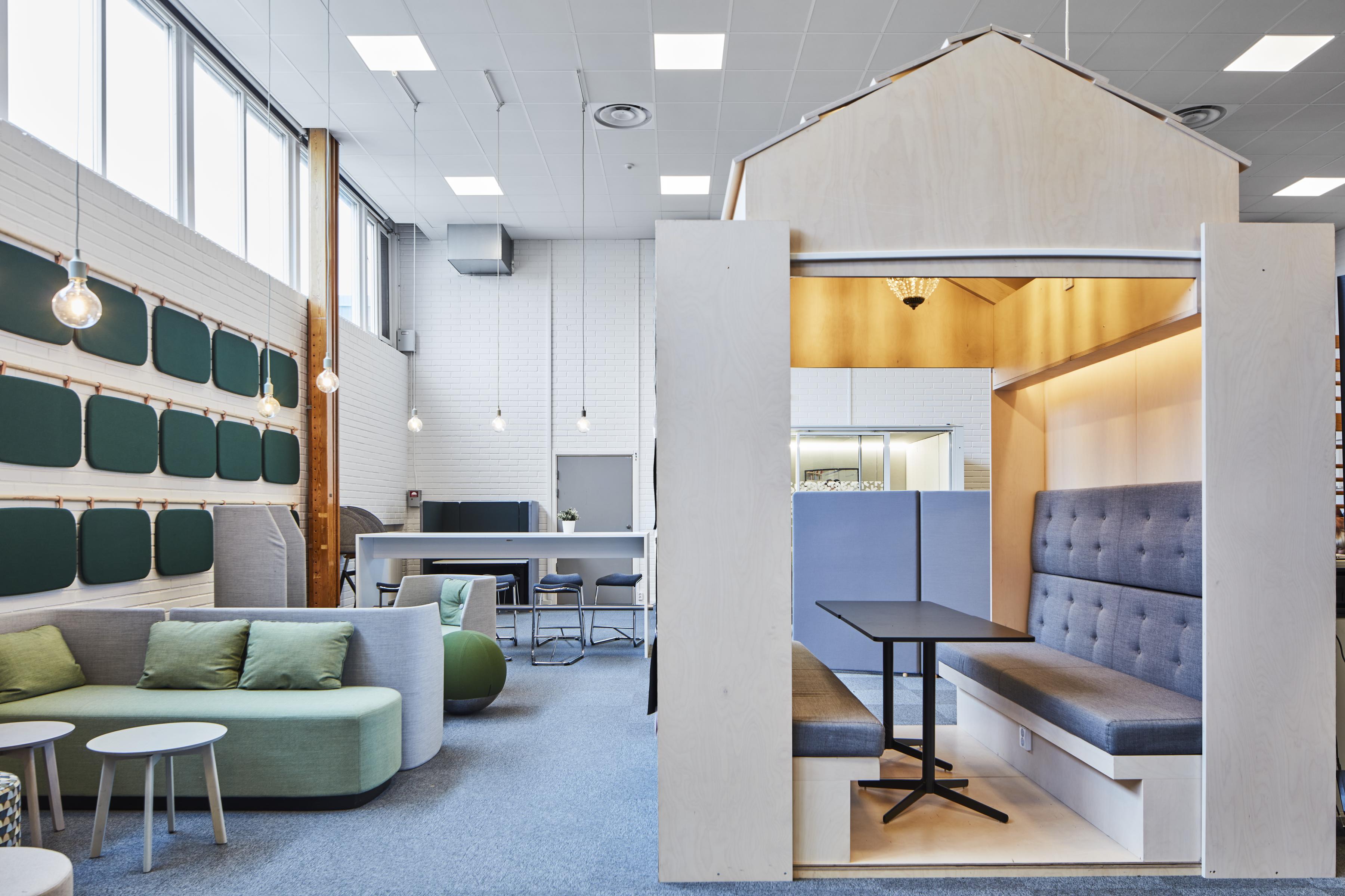 Open-learning area with suspended acoustic ceiling.