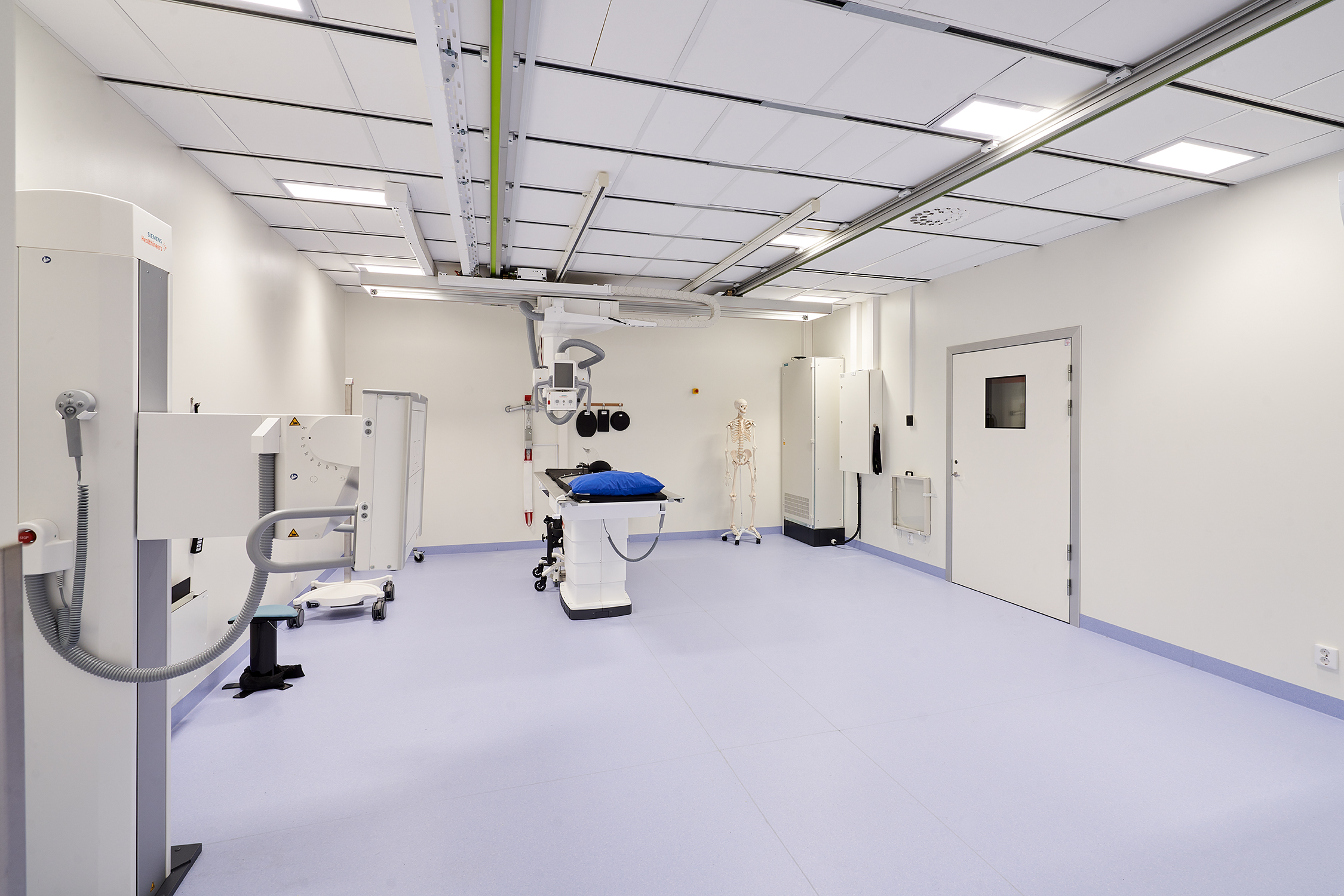 White, suspended acoustic ceiling in radiology facility