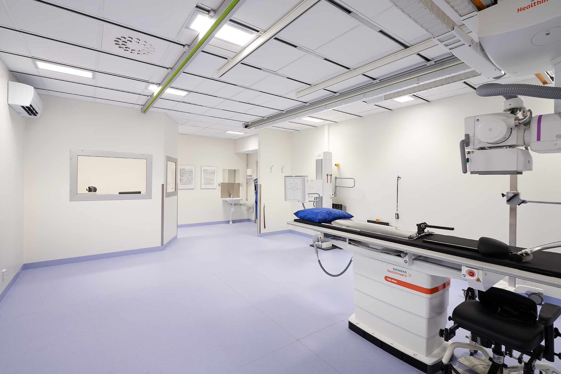 White, suspended acoustic ceiling in radiology facility