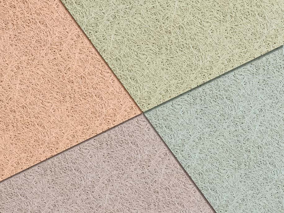 Close-up of acoustic wood wool panels in different pastel colours