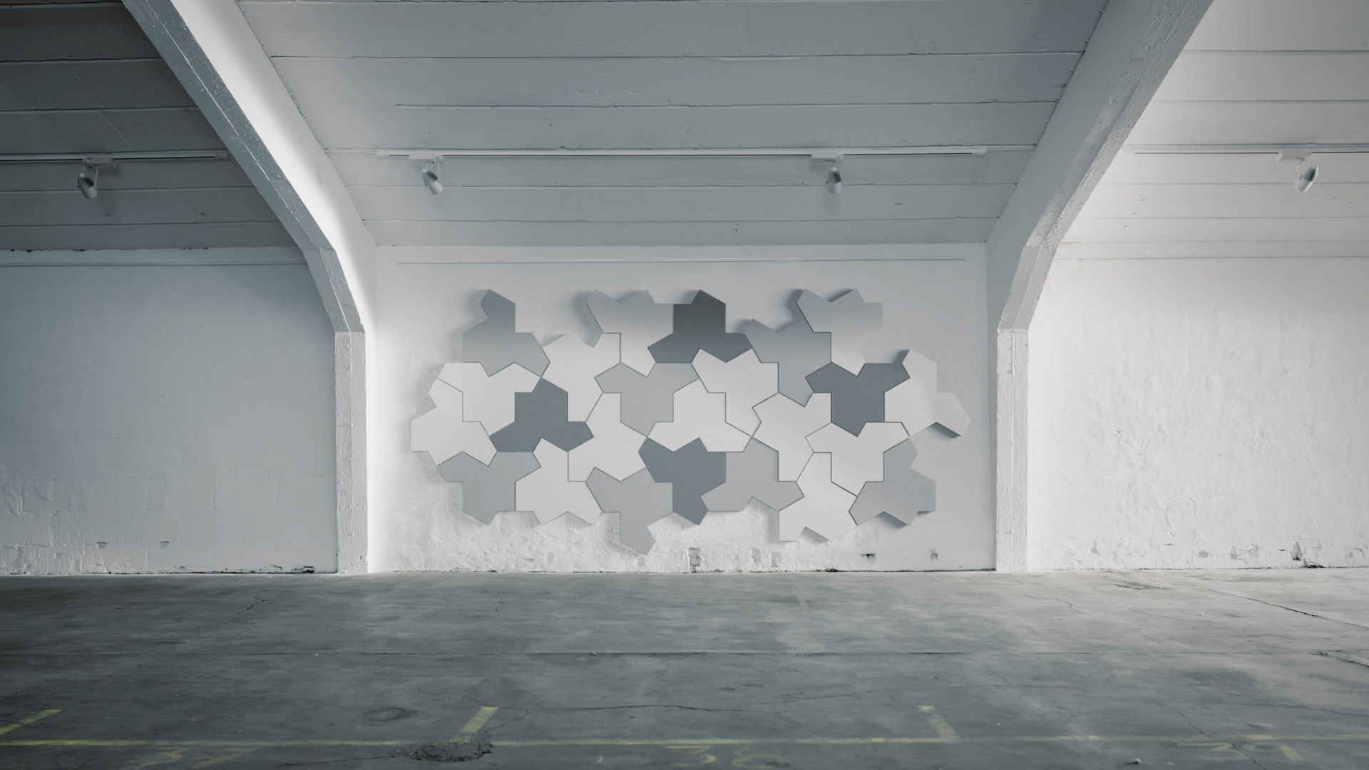 Jigsaw shaped acoustic wall panels in industrial premises