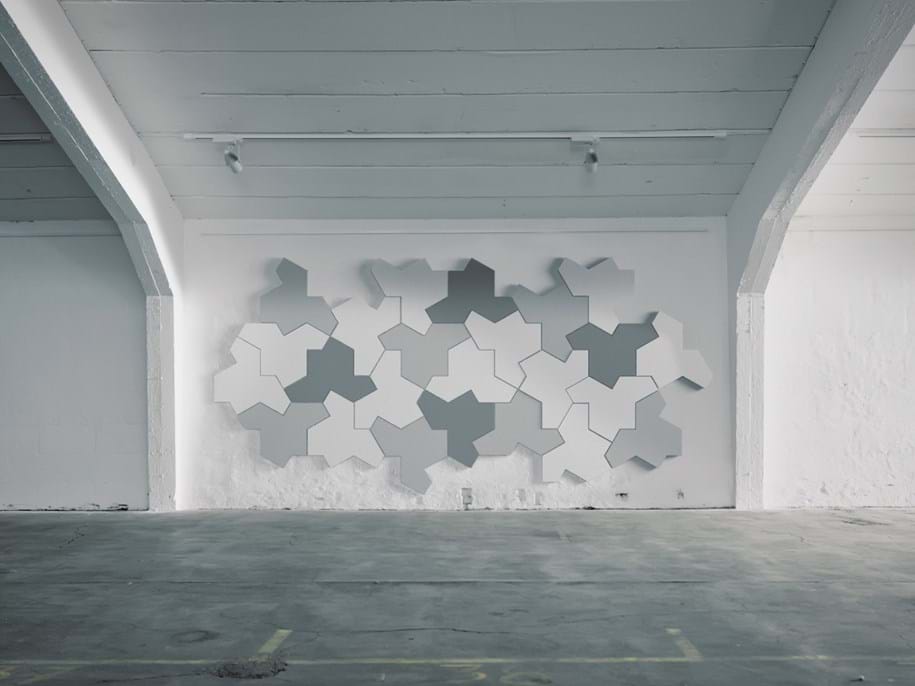 Jigsaw shaped acoustic wall panels in industrial premises
